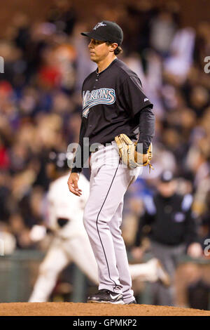 July 27, 2010; San Francisco, CA, USA;  Florida Marlins relief pitcher Brian Sanches (44) reacts after giving up a one run home run to San Francisco Giants shortstop Juan Uribe (back) during the eighth inning at AT&T Park. Stock Photo