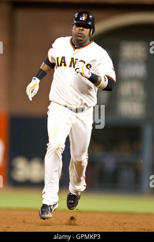 July 27, 2010; San Francisco, CA, USA;  San Francisco Giants shortstop Juan Uribe (5) rounds the bases after hitting a one run home run off Florida Marlins relief pitcher Brian Sanches (not pictured) during the eighth inning at AT&T Park. Stock Photo