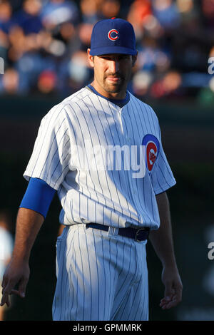 August 16, 2010; Chicago, IL, USA;  Chicago Cubs right fielder Xavier Nady (22) warms up before the game against the San Diego Padres at Wrigley Field.  San Diego defeated Chicago 9-5. Stock Photo