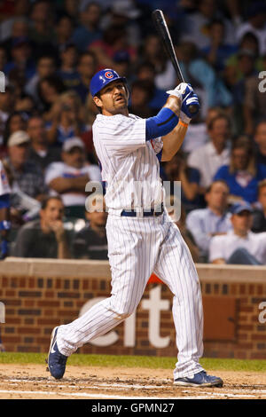 August 17, 2010; Chicago, IL, USA;  Chicago Cubs right fielder Xavier Nady (22) at bat against the San Diego Padres during the second inning at Wrigley Field.  San Diego defeated Chicago 1-0. Stock Photo