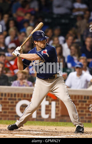 August 17, 2010; Chicago, IL, USA;  San Diego Padres left fielder Chris Denorfia (13) at bat against the Chicago Cubs during the fourth inning at Wrigley Field.  San Diego defeated Chicago 1-0. Stock Photo