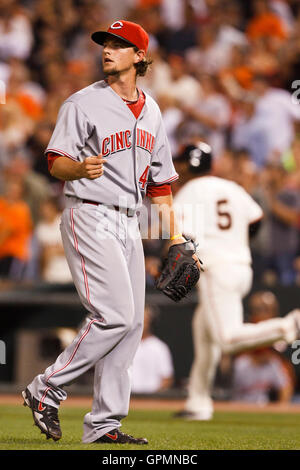 August 24, 2010; San Francisco, CA, USA;  Cincinnati Reds starting pitcher Mike Leake (44) watches as San Francisco Giants shortstop Juan Uribe (back) hits a two run home run during the fifth inning at AT&T Park. Stock Photo