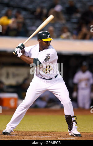 September 21, 2010; Oakland, CA, USA;  Oakland Athletics left fielder Chris Carter (22) at bat against the Chicago White Sox during the second inning at Oakland-Alameda County Coliseum. Oakland defeated Chicago 7-2. Stock Photo