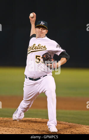 September 21, 2010; Oakland, CA, USA;  Oakland Athletics starting pitcher Trevor Cahill (53) pitches against the Chicago White Sox during the third inning at Oakland-Alameda County Coliseum. Stock Photo