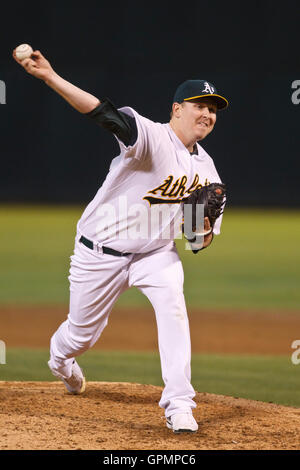 September 21, 2010; Oakland, CA, USA;  Oakland Athletics starting pitcher Trevor Cahill (53) pitches against the Chicago White Sox during the third inning at Oakland-Alameda County Coliseum. Stock Photo