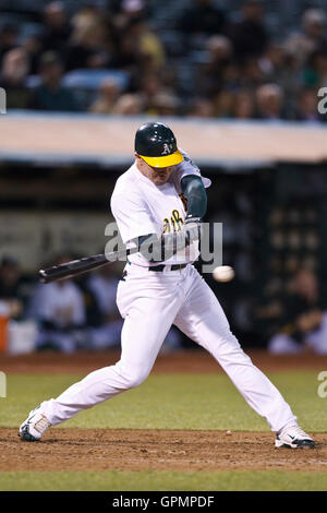 September 21, 2010; Oakland, CA, USA;  Oakland Athletics right fielder Matt Carson (25) at bat against the Chicago White Sox during the seventh inning at Oakland-Alameda County Coliseum. Oakland defeated Chicago 7-2. Stock Photo