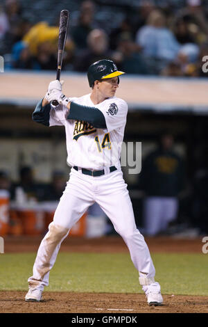 September 21, 2010; Oakland, CA, USA;  Oakland Athletics second baseman Mark Ellis (14) at bat against the Chicago White Sox during the eighth inning at Oakland-Alameda County Coliseum. Oakland defeated Chicago 7-2. Stock Photo