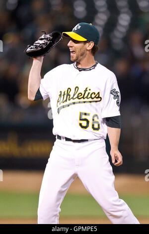 September 21, 2010; Oakland, CA, USA;  Oakland Athletics relief pitcher Craig Breslow (56) celebrates at the end of the game against the Chicago White Sox at Oakland-Alameda County Coliseum. Oakland defeated Chicago 7-2. Stock Photo