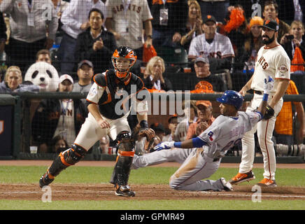 San Francisco Giants pitcher and World Series MVP Madison Bumgarner (R)  hugs his catcher Buster Posey after the final out in game 7 of the World  Series at Kauffman Stadium in Kansas