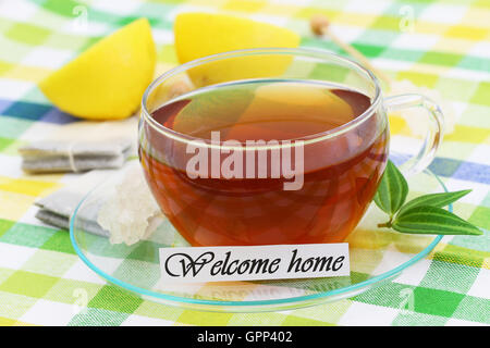 Welcome home card with cup of tea with fresh lemon Stock Photo