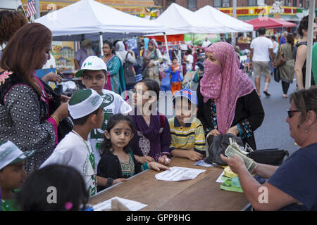 Coney Island Avenue during the Pakistani Mela celebrating Pakistan's independence day.  Brooklyn, NY. Stock Photo