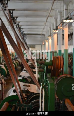 Inside of the factory room of the Boott Cotton Mills museum at the Lowell National Historic Park, in Lowell Massachusetts. Stock Photo