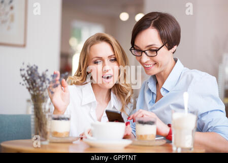 Two pretty women having fun Stock Photo