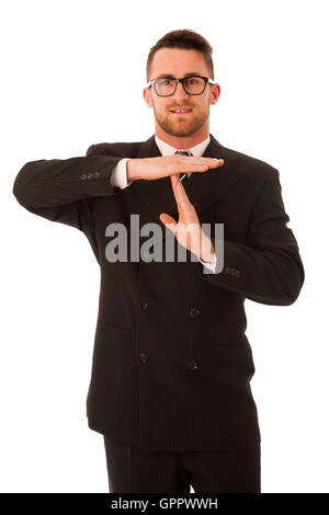 Businessman in formal suit gesturing time out isolated over white background. Stock Photo