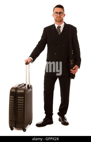 Successful businessman in formal suit and briefcase going on business trip isolated over white. Stock Photo