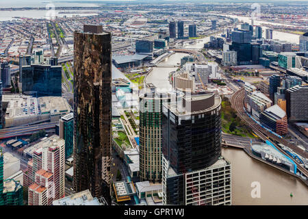 Melbourne, Australia - August 27, 2016:  Aerial view of Melbourne CBD with skyscrapers and yarra river winding through.