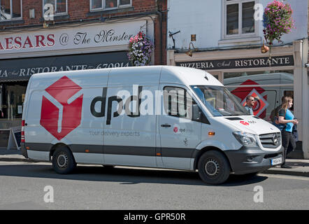 DPD delivery van vehicle delivering in the town city centre York North Yorkshire England UK United Kingdom GB Great Britain Stock Photo