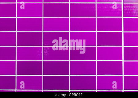 A purple tiled background with relatively small tiles Stock Photo