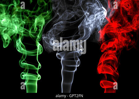 Smoke effects that represent the Italian flag on a black background Stock Photo