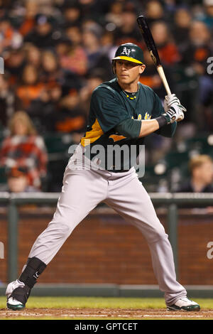 March 28, 2011; San Francisco, CA, USA;  Oakland Athletics right fielder Ryan Sweeney (15) at bat against the San Francisco Giants during the sixth inning at AT&T Park.  San Francisco defeated Oakland 4-3. Stock Photo