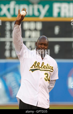 April 1, 2011; Oakland, CA, USA; Former Oakland Athletics pitcher Dave  Stewart throws out the ceremonial first pitch before the game against the  Seattle Mariners at Oakland-Alameda County Coliseum Stock Photo - Alamy