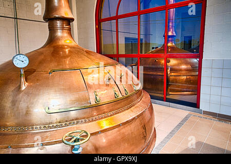 Traditional copper distillery tanks in a beer brewery Stock Photo