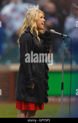 May 14, 2011; Chicago, IL, USA;  Miss America Teresa Scanlan sings the national anthem before the game between the Chicago Cubs and the San Francisco Giants at Wrigley Field. Stock Photo