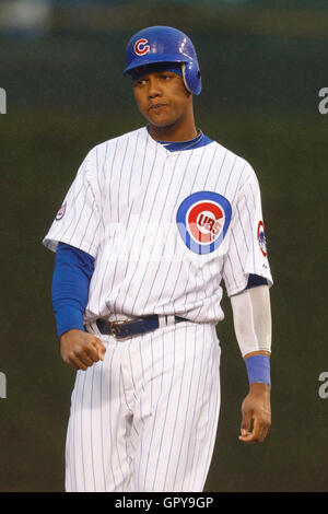 May 14, 2011; Chicago, IL, USA;  Chicago Cubs shortstop Starlin Castro (13) stands on second base during the first inning against the San Francisco Giants at Wrigley Field.  San Francisco defeated Chicago 3-0 in a rain shortened game. Stock Photo