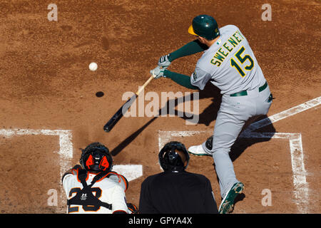 May 21, 2011; San Francisco, CA, USA;  Oakland Athletics left fielder Ryan Sweeney (15) at bat against the San Francisco Giants during the fourth inning at AT&T Park.  San Francisco defeated Oakland 3-0. Stock Photo