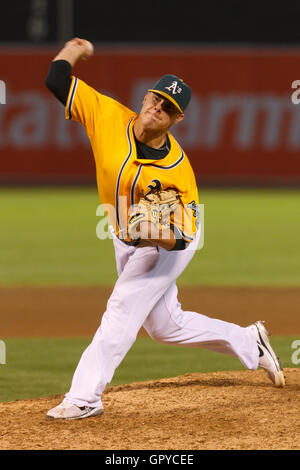 June 18, 2011; Oakland, CA, USA;  Oakland Athletics relief pitcher Andrew Bailey (40) pitches against the San Francisco Giants during the ninth inning at the O.co Coliseum.  Oakland defeated San Francisco 4-2. Stock Photo