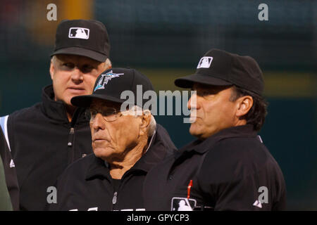 June 28, 2011; Oakland, CA, USA; Florida Marlins interim manager Jack McKeon (center) meets with umpires before the game against the Oakland Athletics at the O.co Coliseum.  Oakland defeated Florida 1-0. Stock Photo