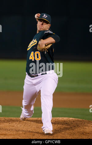 June 28, 2011; Oakland, CA, USA; Oakland Athletics relief pitcher Andrew Bailey (40) pitches against the Florida Marlins during the ninth inning at the O.co Coliseum. Oakland defeated Florida 1-0. Stock Photo