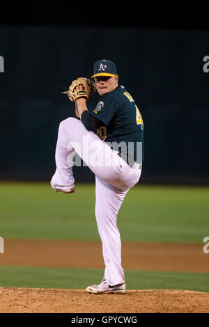 June 28, 2011; Oakland, CA, USA; Oakland Athletics relief pitcher Andrew Bailey (40) pitches against the Florida Marlins during the ninth inning at the O.co Coliseum. Oakland defeated Florida 1-0. Stock Photo