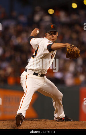 San Francisco Giants reliever Javier Lopez stands in a downpour while  pitching against the St. Louis Cardinals during game seven of the National  League Championship Series at AT&T Park in San Francisco