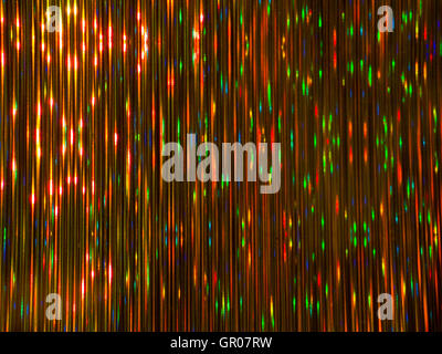 Dark golden colorful sparkling vertical striped background Stock Photo