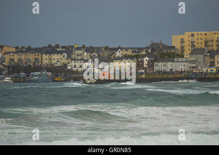 Portrush, Northern Ireland - August 31st 2013 - Stormy conditions looking over West Bay towards Portrush Harbour Stock Photo