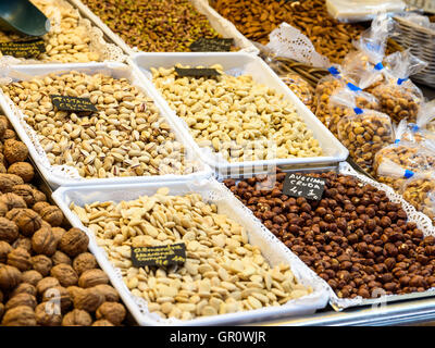 Nuts, Pistachio, Almonds And Peanuts For Sale In Fruit Market Stock Photo