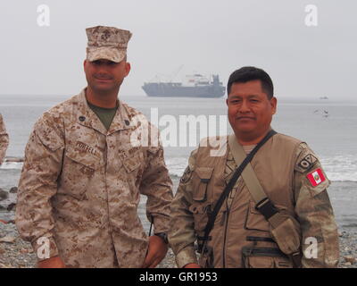 Lima, Peru. 5th September, 2016. A USMC Sargent and his peruvian counterpart, with the USNS Pililaau as background, as part of USMC task force arrived to Lima, onboard USNS Pililaau (T-AKR-304), for humanitarian exercises with their Peruvian counterparts as part of exercise Koa Mohana.(C) Carlos Garcia Granthon/Fotoholica/Alamy Live News Stock Photo