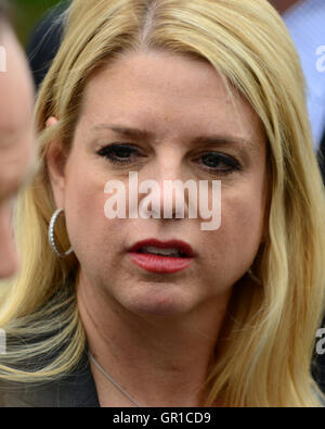 US Attorney General Pam Bondi walks to the White House for meetings