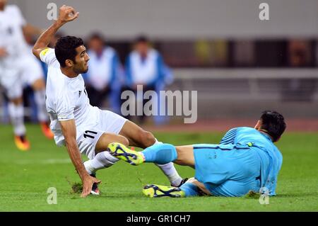 Shenyang, China's Liaoning Province. 6th Sep, 2016. China's goalkeeper Zeng Cheng (R) clashes with Iran's Vahid Amiri during the Russia 2018 World Cup Asian Qualifier match between China and Iran in Shenyang, capital of northeast China's Liaoning Province, on Sept. 6, 2016. © Tao Xiyi/Xinhua/Alamy Live News Stock Photo