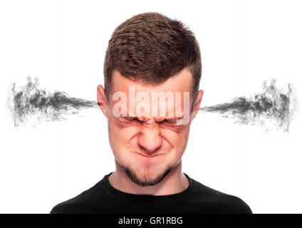 Angry man with smoke or fume coming out from his ears on white background. Stock Photo