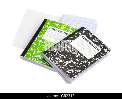 Three composition notebooks with one opened on a white background. Stock Photo