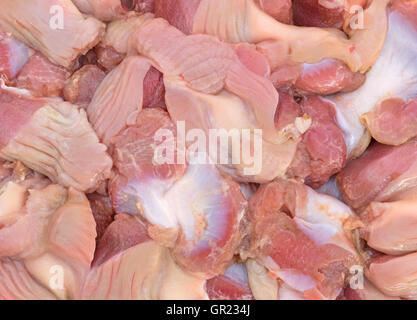 A very close view of fresh chicken gizzards and hearts. Stock Photo