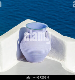 greek amfora against volcano caldera, Santorini island, Greece Stock Photo