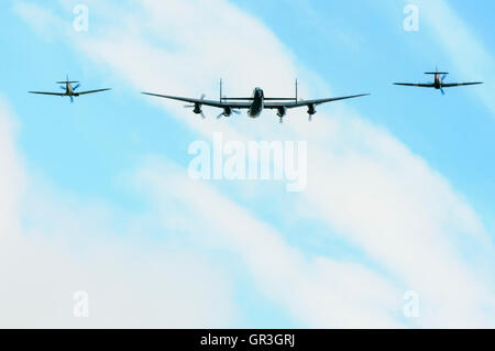 One of only two flying Avro Lancaster Bombers, PA474 accompanied by one of four flying Spitfires and one of 12 Hawker Hurricanes Stock Photo