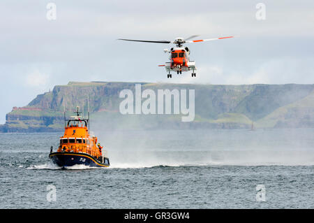 Sikorsky S-92 from the Irish Coastguard accompanies Portrush Lifeboat, RNLB William Gordon Burr Stock Photo