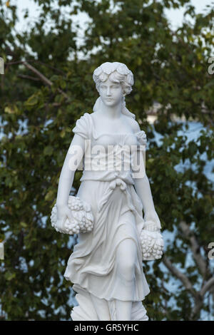 Statue of a beautiful woman in summer Stock Photo - Alamy