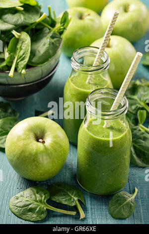 Green smoothie with spinach and apples in glass Stock Photo