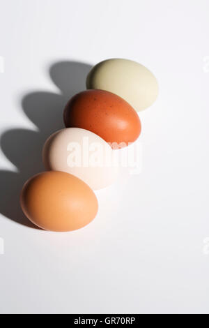 Four Eggs In A Row Stock Photo