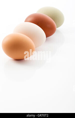 Four Eggs In A Row Stock Photo